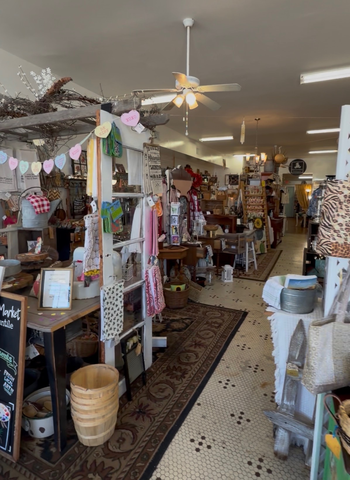 Inside Bare Wood Market - charming artisan displays, handmade crafts, and vintage decor