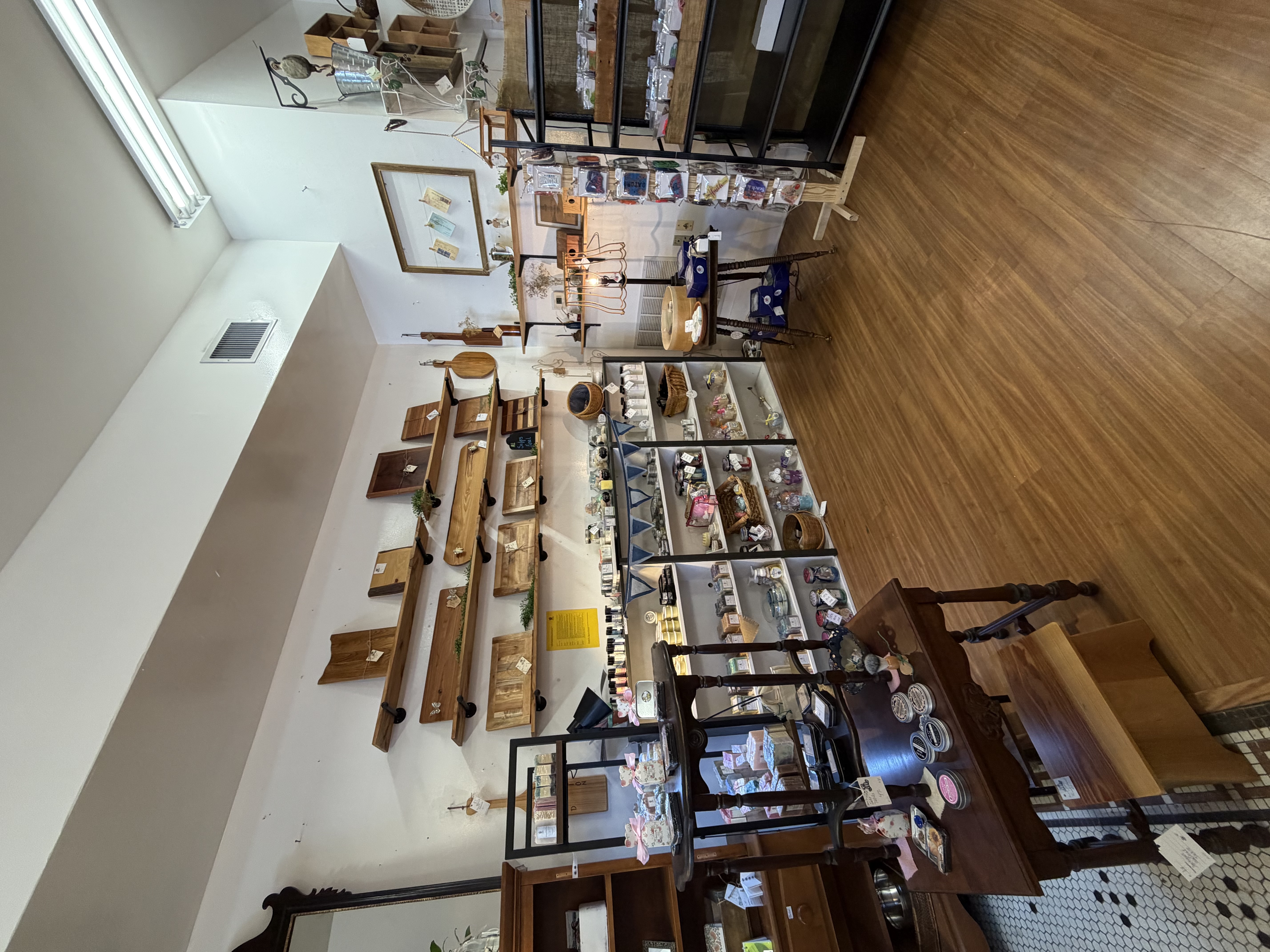 Inside Bare Wood Market - shelves filled with handcrafted goods and local art